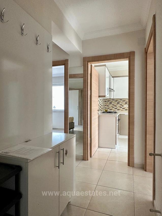 Apartment For Rent In Köyceğiz Town Center. Ground Floor, 2+1 Bedrooms, Closed Kitchen & Air Conditioning.