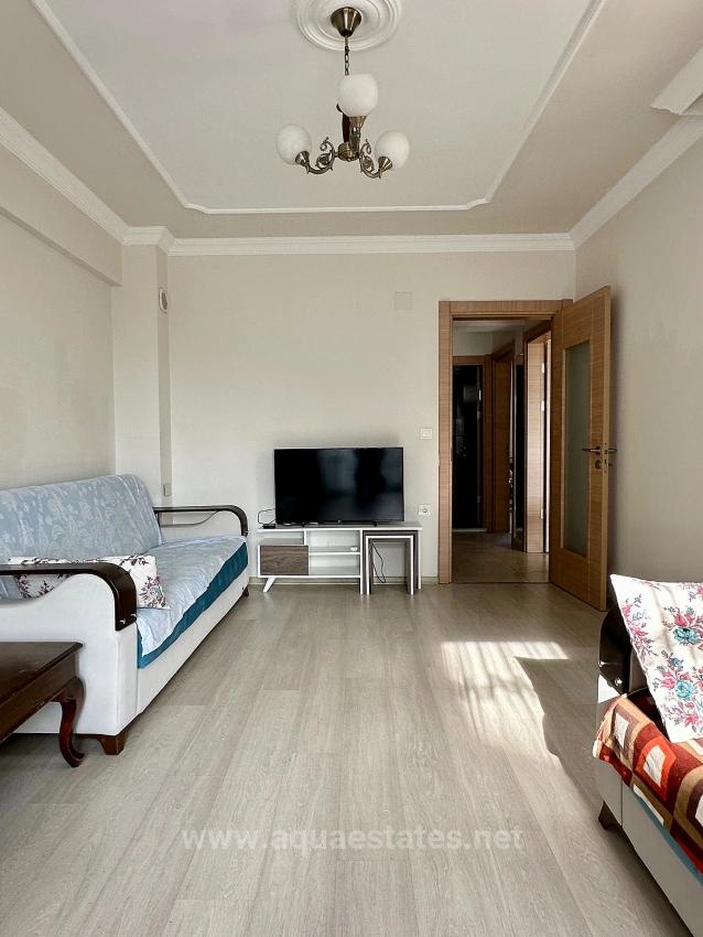 Apartment For Rent In Köyceğiz Town Center. Ground Floor, 2+1 Bedrooms, Closed Kitchen & Air Conditioning.