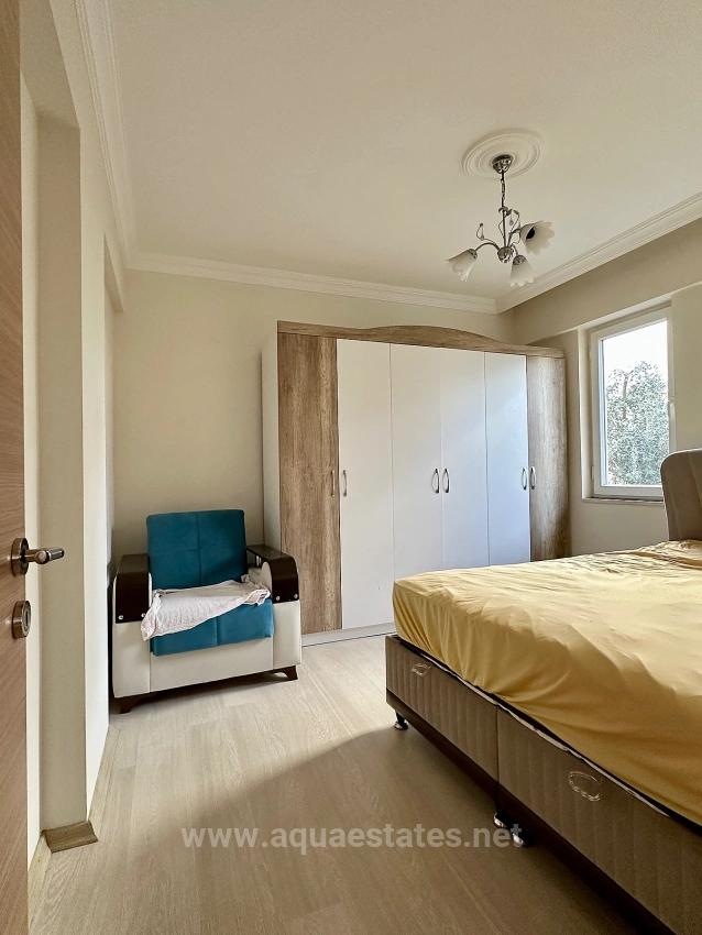 Apartment For Rent In Köyceğiz Town Center. Ground Floor, 2+1 Bedrooms, Closed Kitchen & Air Conditioning.