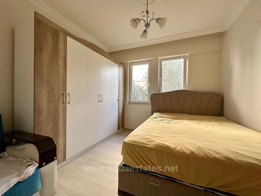 Apartment For Rent In Köyceğiz Town Center. Ground Floor, 2+1 Bedrooms, Closed Kitchen & Air Conditioning.