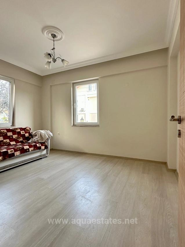 Apartment For Rent In Köyceğiz Town Center. Ground Floor, 2+1 Bedrooms, Closed Kitchen & Air Conditioning.